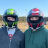 Two friends in karting helmets